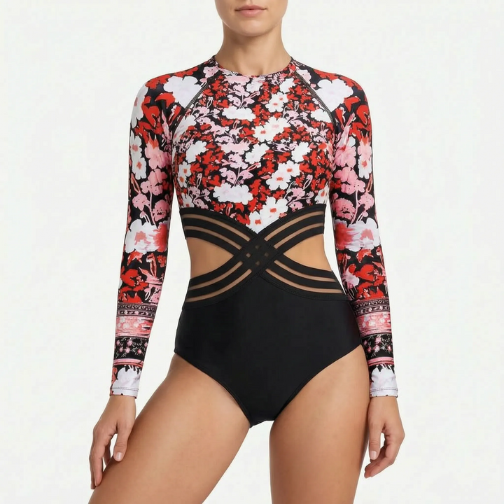 Vibrant color block long-sleeve women's swimsuit with modern cutouts, designed for dynamic active beach days.