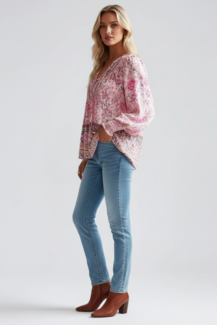 Elegant women's floral pattern long sleeve blouse. Flowy V-neck top, perfect for casual spring & summer fashion.