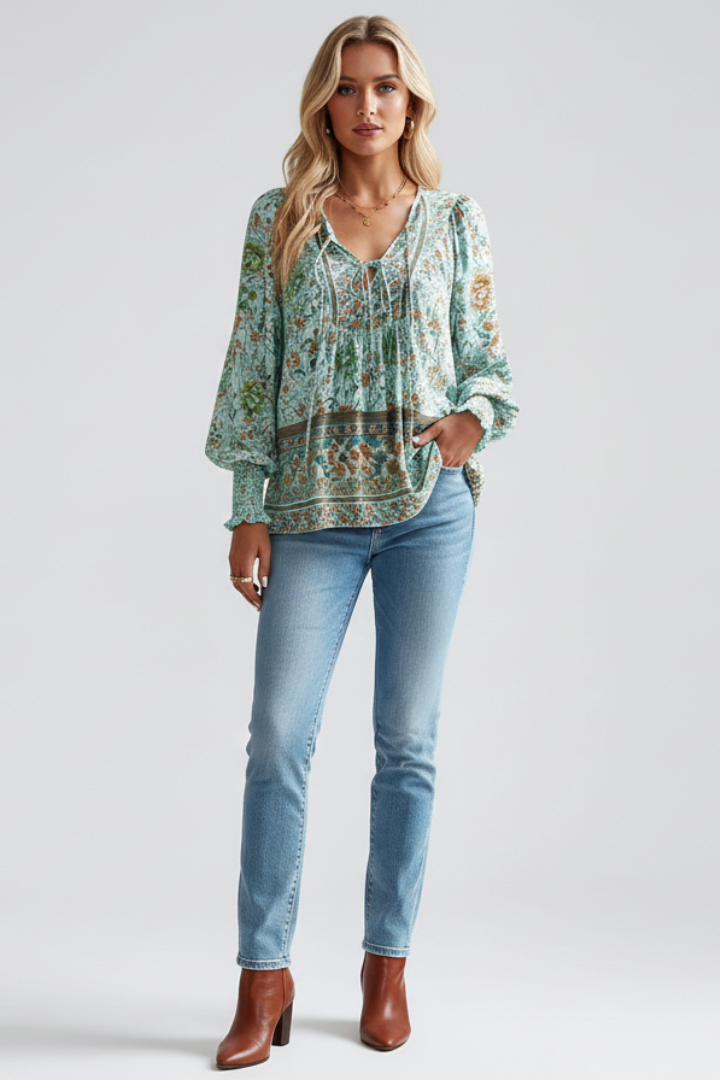 Fashionable women's floral long sleeve top. Chic V-neck blouse for spring & summer casual styling.