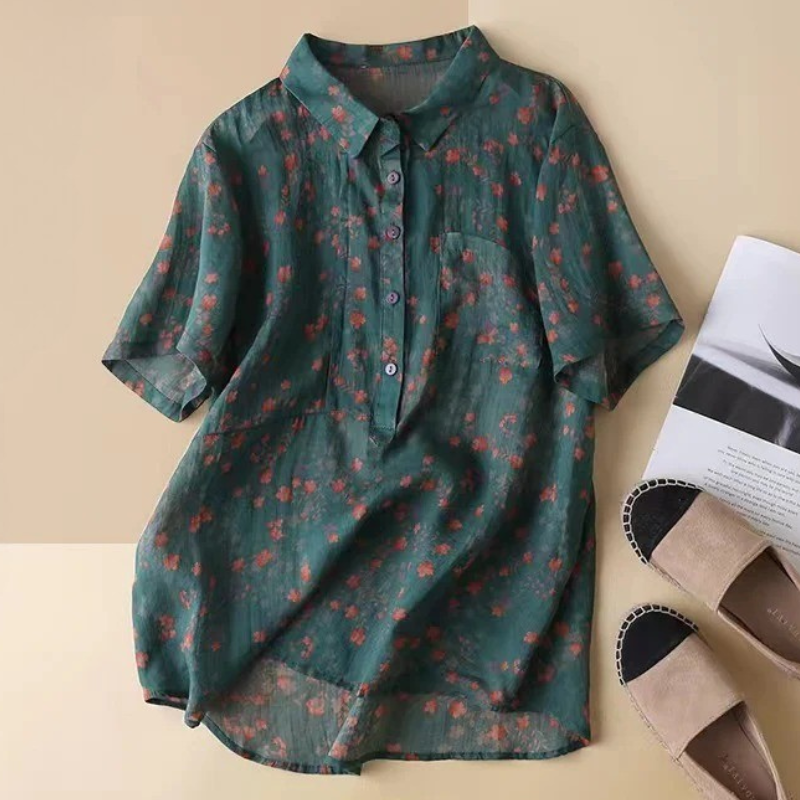 Women's long-sleeve floral half-placket shirt with button details. Perfect for spring & summer casual elegance.