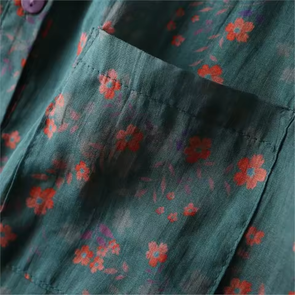 Elegant women's floral print long-sleeve blouse with a unique half-placket & button-up front design.