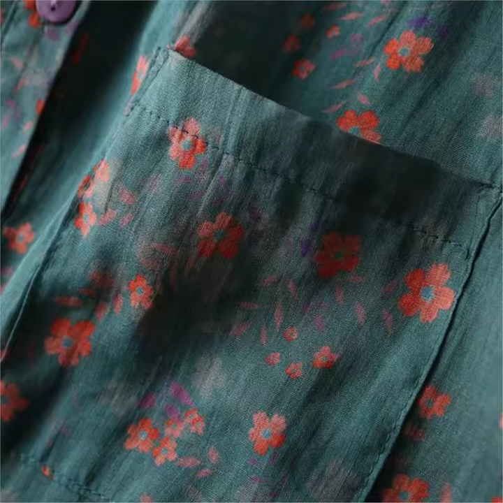 Elegant women's floral print long-sleeve blouse with a unique half-placket & button-up front design.