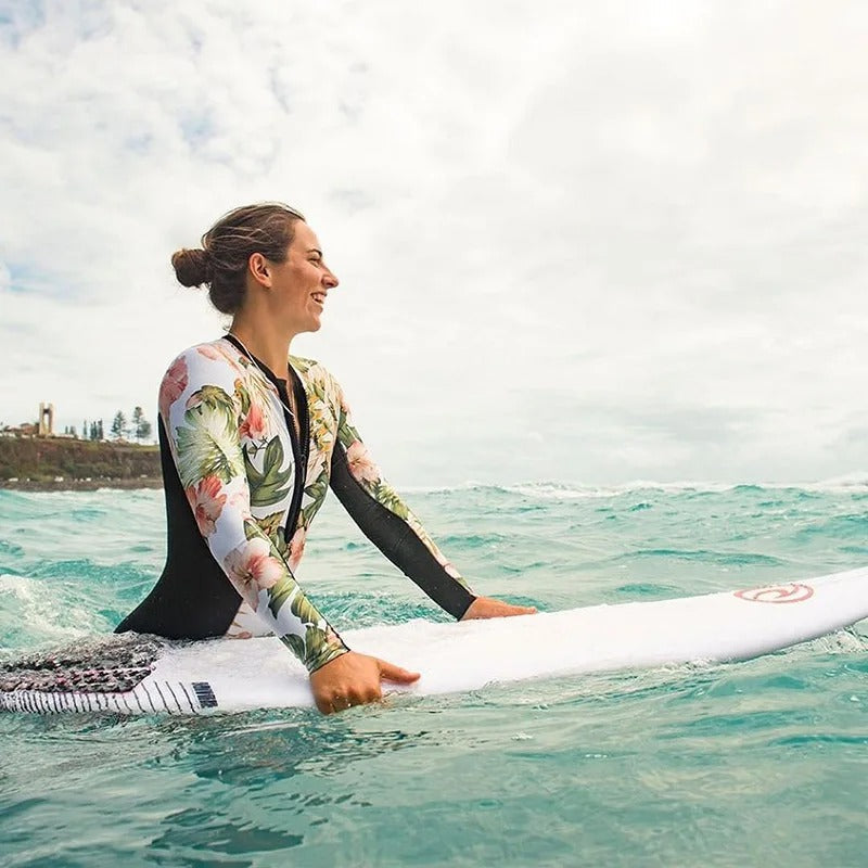 Stylish women's athletic long sleeve one-piece swimwear, designed for comfort, support, and active summer holidays.