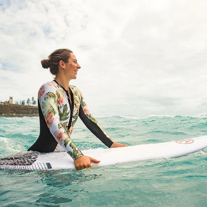 Stylish women's athletic long sleeve one-piece swimwear, designed for comfort, support, and active summer holidays.
