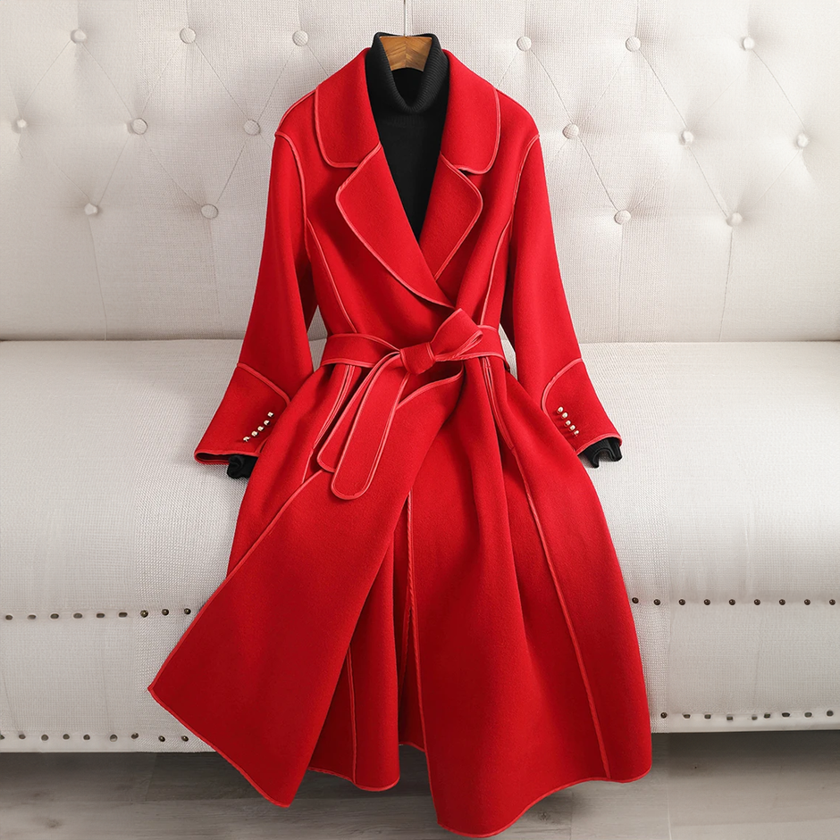 Women's tailored long trenchcoat with a chic belted waist. Classic fit, ideal fall & winter fashion outerwear.