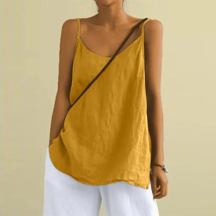 Versatile women's loose fit cami top, a casual sleeveless tank blouse for summer outfits, beach, or vacation.
