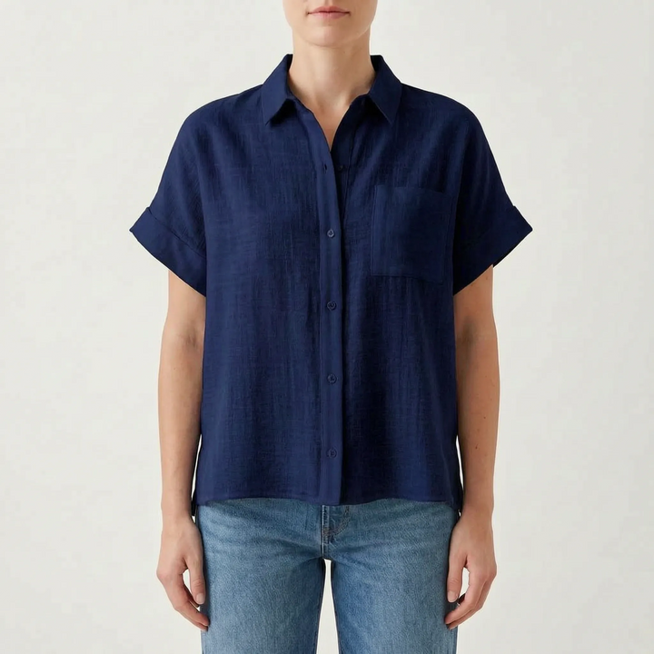 Textured women's short-sleeve button-down shirt, loose fit and comfortable for summer everyday wear.