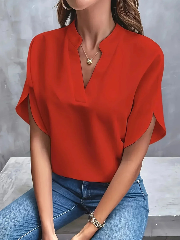 Lightweight summer women's V-neck blouse with short sleeves. Loose fit design for ultimate comfort and casual style.