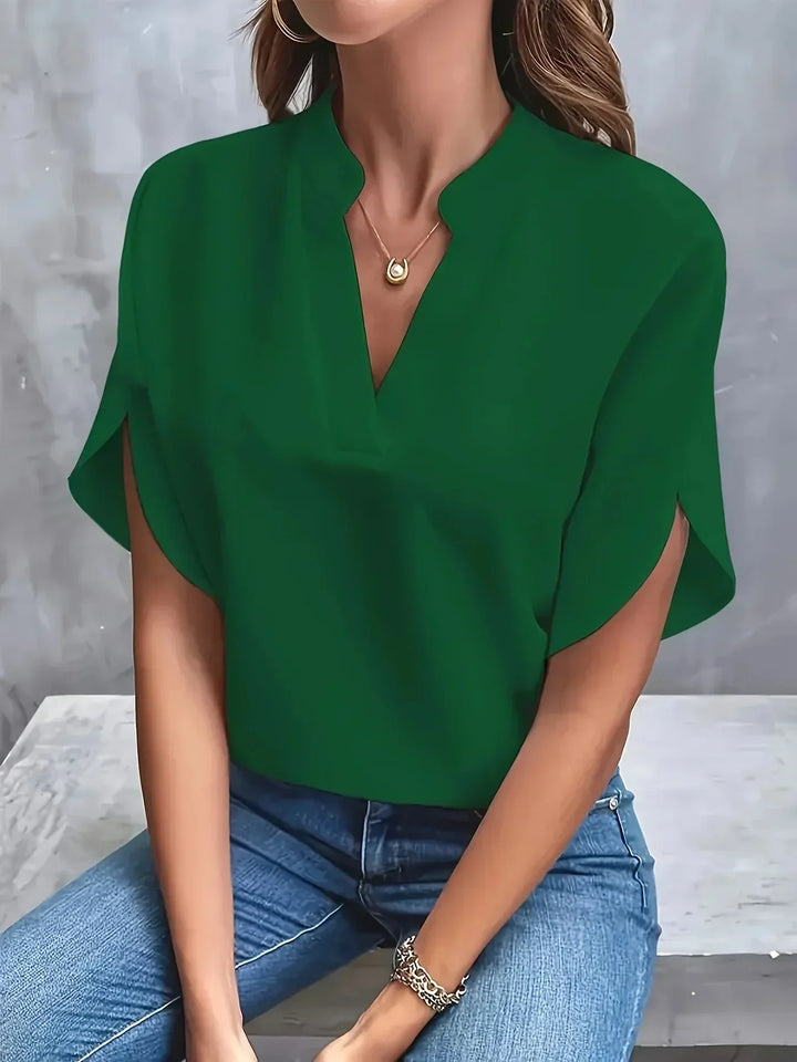 Versatile women's short sleeve V-neck blouse. Loose fit, comfortable, and elegant for casual or office everyday wear.