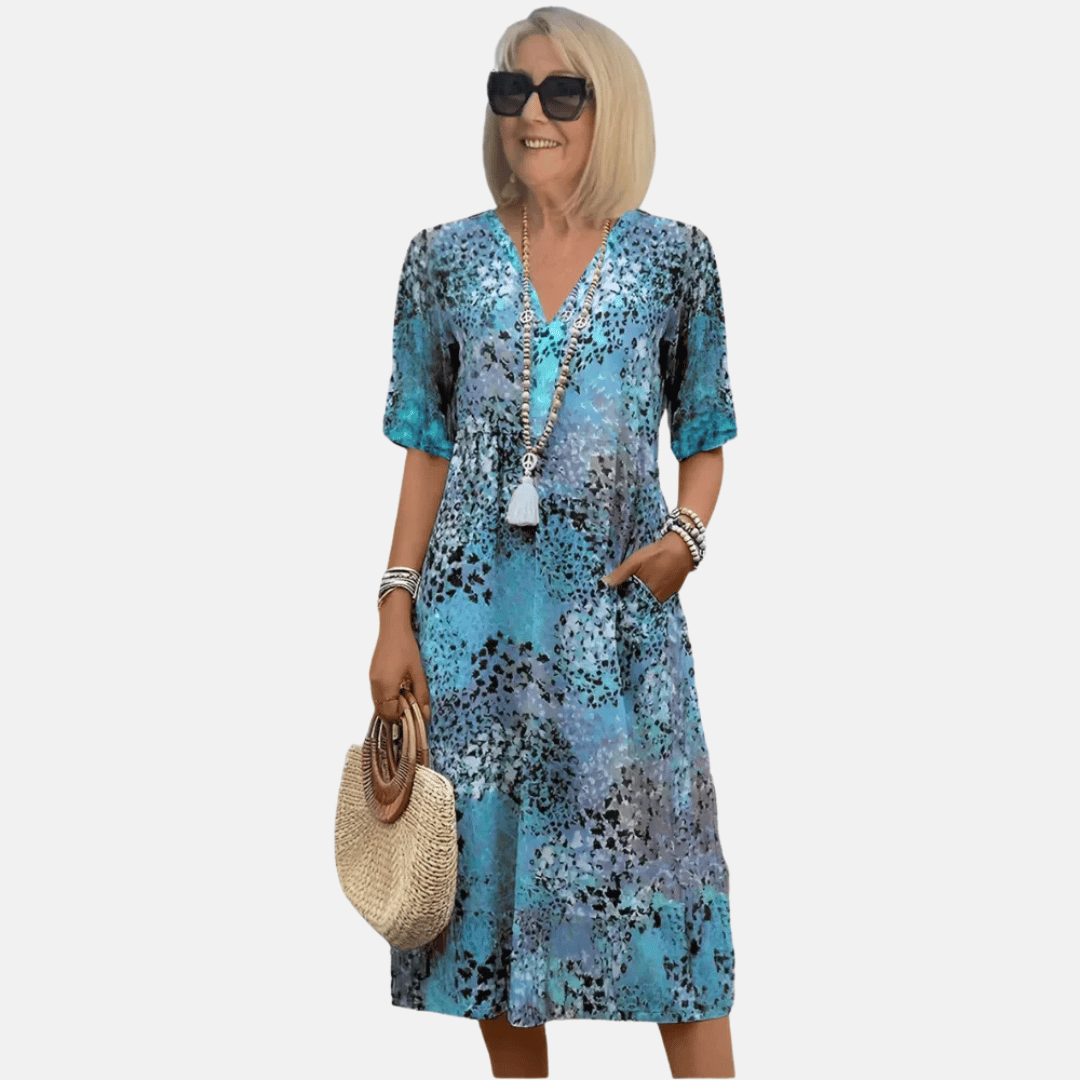 Bohemian A-line vintage style women's summer dress, loose fit with a V-neck, knee-length for casual comfort.