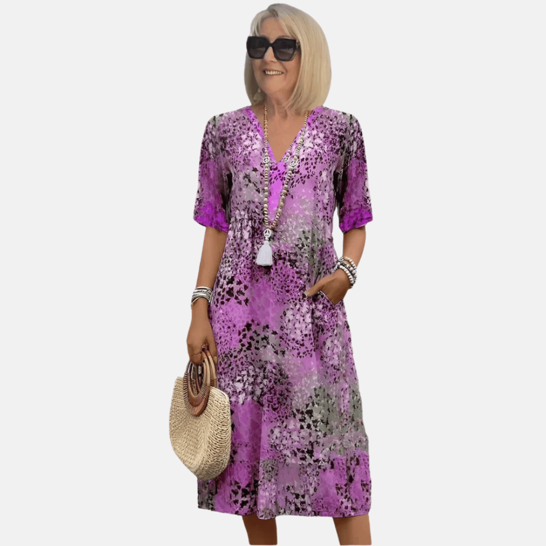 Comfortable women's short sleeve casual summer dress, loose fit printed sundress, ideal for vacation & effortless style.