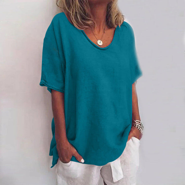 Comfortable women's oversized tee, a loose fit round neck summer top designed for relaxed, casual wear.
