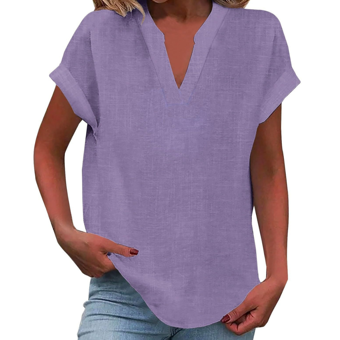 Women's loose fit V-neck blouse for comfortable summer style and casual wear, an effortless everyday top.