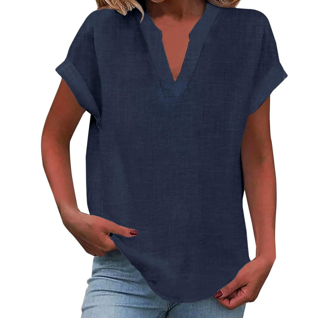 Versatile loose fit V-neck women's blouse, a short sleeve top for various stylish summer fashion looks.