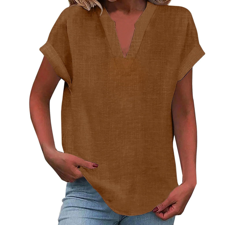 Comfortable short sleeve V-neck women's blouse, loose fit design for versatile summer casual everyday wear.