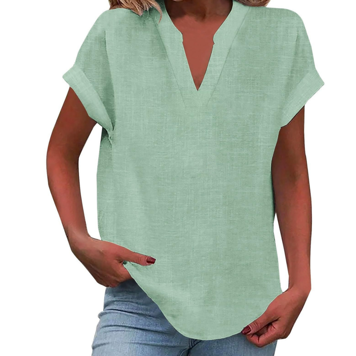 Chic women's V-neck blouse, loose fit & short sleeve for stylish summer and versatile everyday wear.