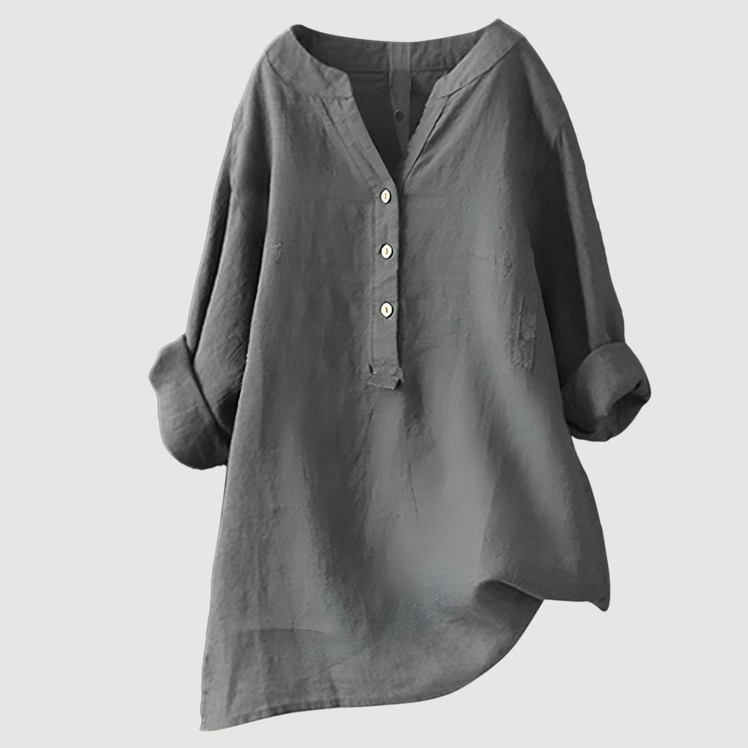 Stylish plus size women's blouse, a versatile loose fit top with V-neck for effortless comfort.