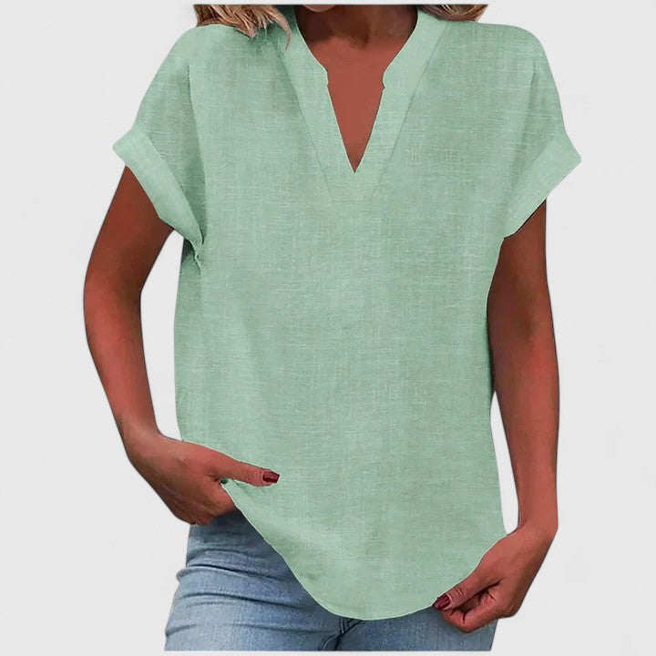 Stylish casual V-neck blouse for women, loose fit with cap sleeves, perfect for daily wear.