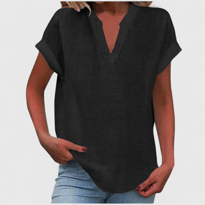 Casual V-neck top for women, loose fit, cap sleeve design, versatile for everyday fashion.