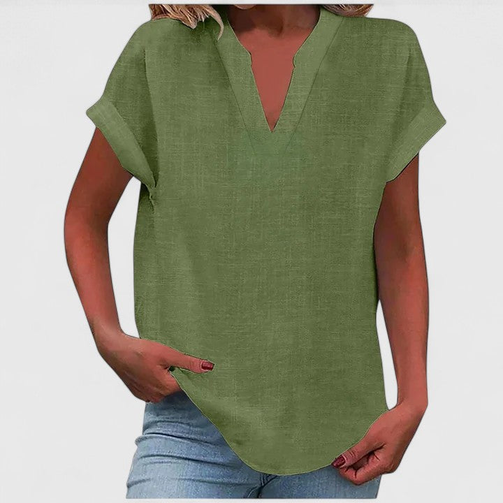 Versatile women's loose fit V-neck blouse, ideal as a casual top with cap sleeves.