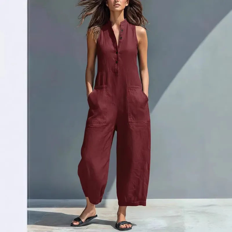 Versatile women's sleeveless jumpsuit with button-up front & stand collar. Loose fit for casual spring/summer.
