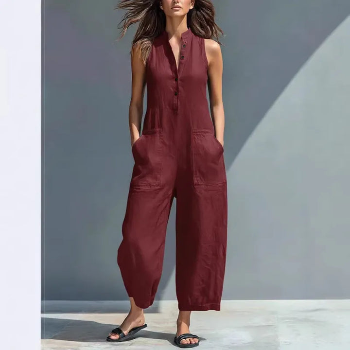 Versatile women's sleeveless jumpsuit with button-up front & stand collar. Loose fit for casual spring/summer.