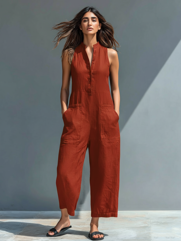 Flowy women's sleeveless jumpsuit with stand collar & button front. Loose fit for relaxed spring/summer style.