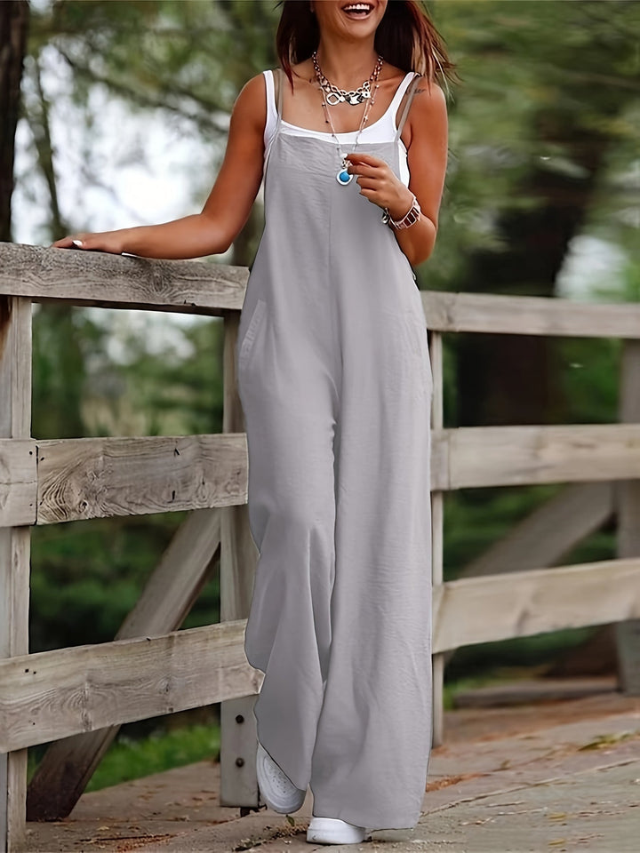 Stylish loose fit sleeveless women's dungaree jumpsuit, great for comfort.