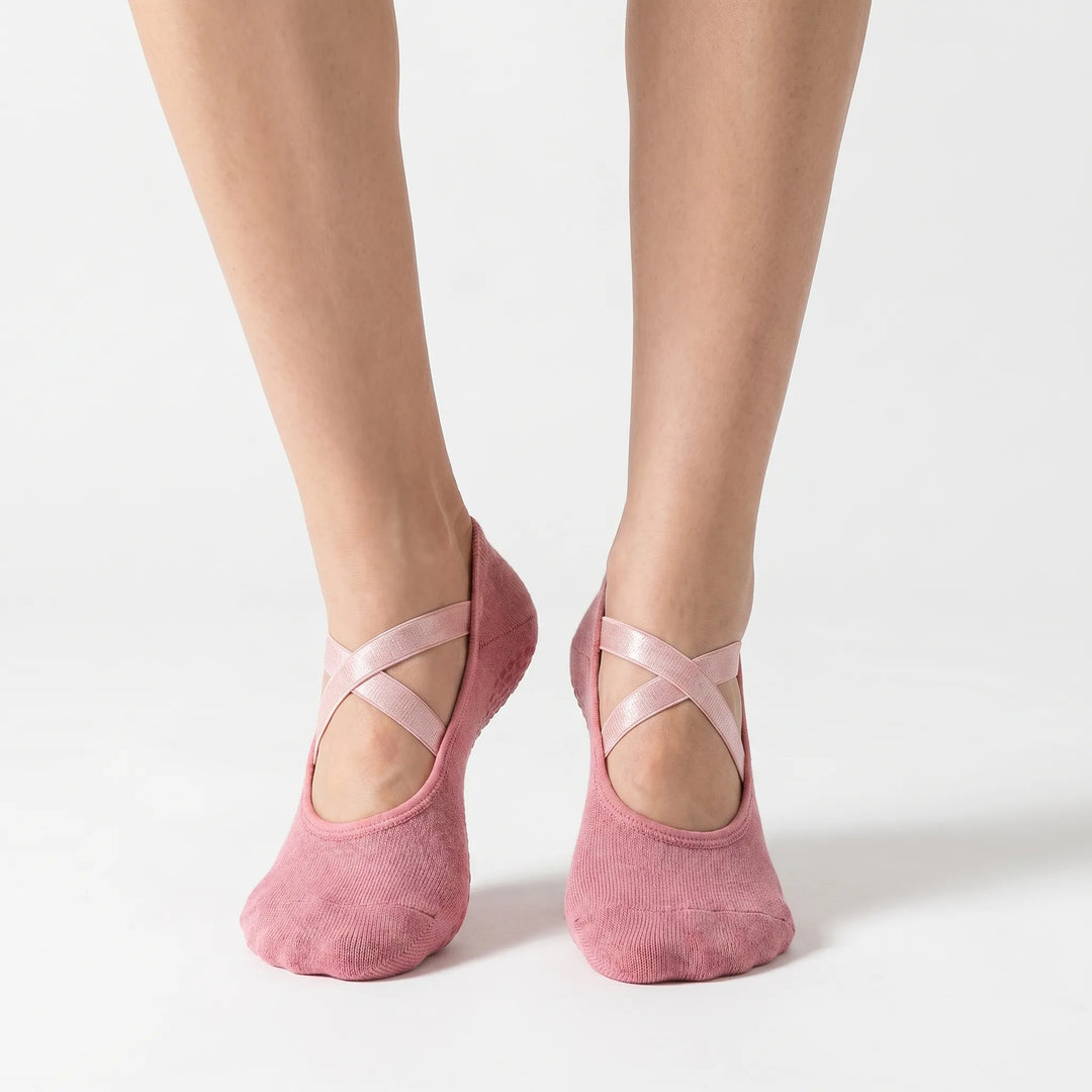 Durable women's low-cut grip socks, perfect for yoga, Pilates, & studio workouts. Non-slip design for secure movement.