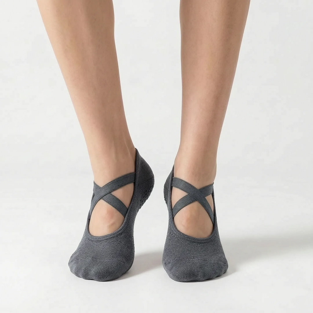 Women's low-cut studio grip socks, designed as non-slip activewear for effective yoga, Pilates, & gym workouts.