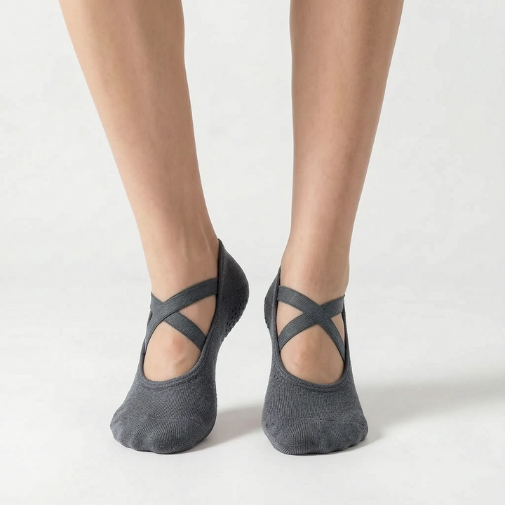 Women's low-cut studio grip socks, designed as non-slip activewear for effective yoga, Pilates, & gym workouts.