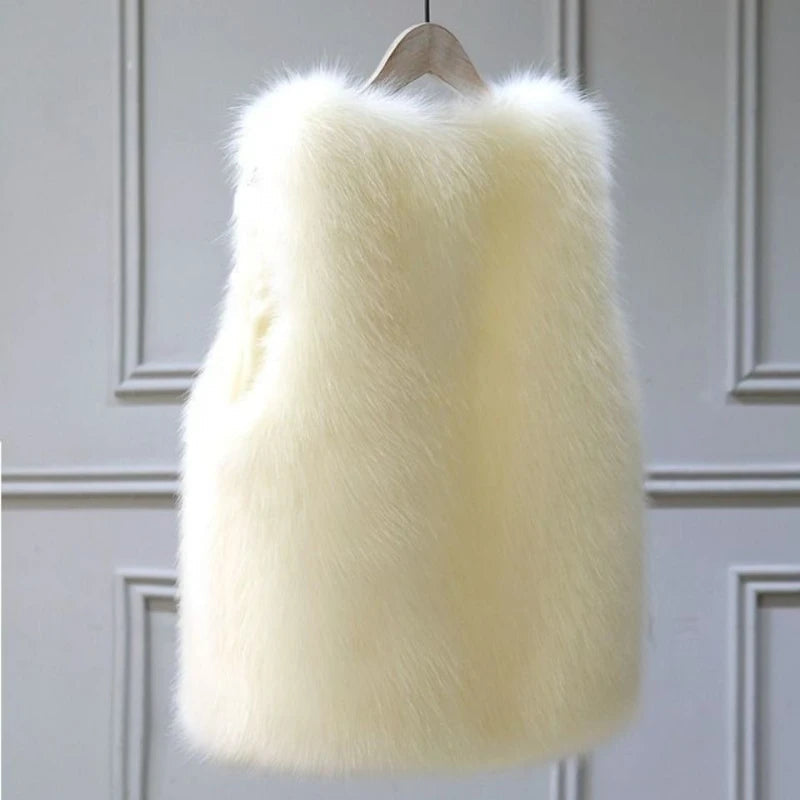 Comfortable women's winter vest. Cozy sleeveless jacket, perfect for elegant layering & cold weather.