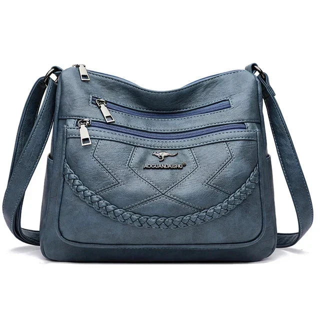 Elegant women's leather shoulder bag, spacious design with comfortable adjustable strap.