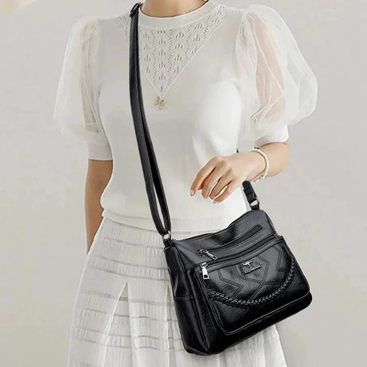 Luxury women's leather shoulder bag with adjustable strap for everyday comfort.