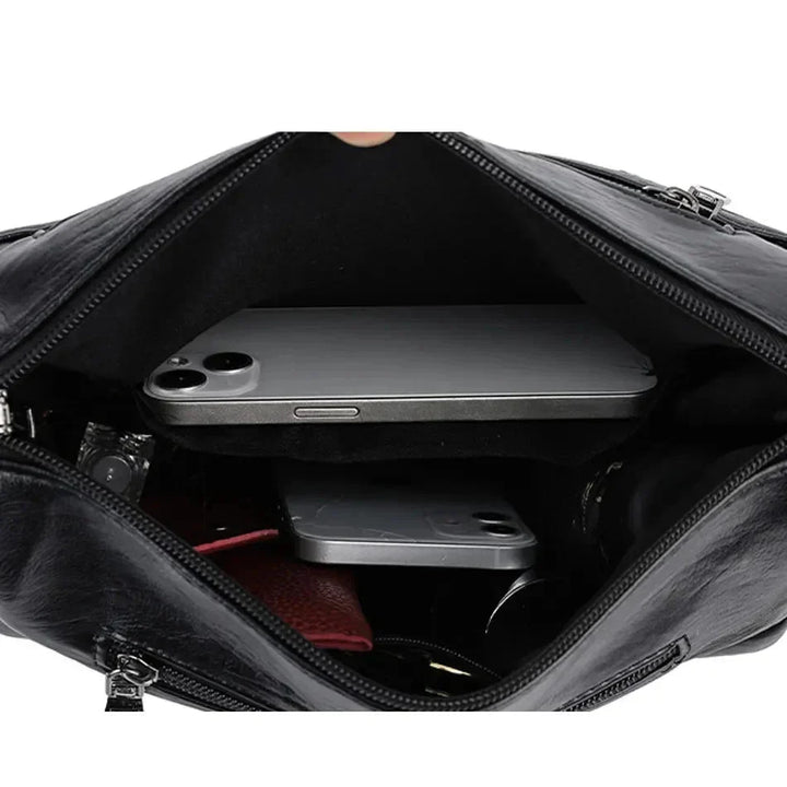 Women's luxury soft leather cross body bag, easily convertible to a shoulder bag.