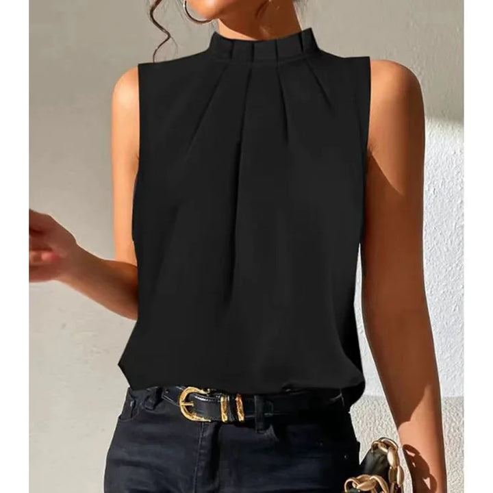 Women's Lynette black pleated top with elegant flared sleeves. Perfect for casual or office wear, versatile fall/winter.