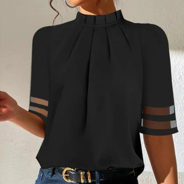 Elegant black pleated top with flared sleeves for women. A versatile Lynette casual top, ideal for office or fall fashion.