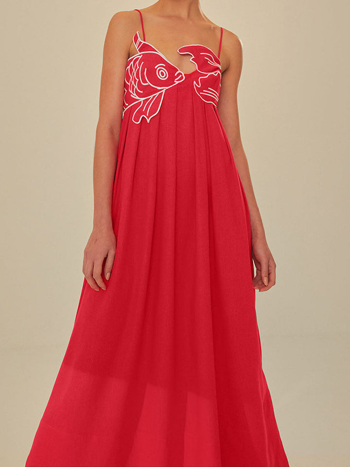 Close-up of intricate embroidery on a Marisol women's maxi dress, showcasing delicate summer design.