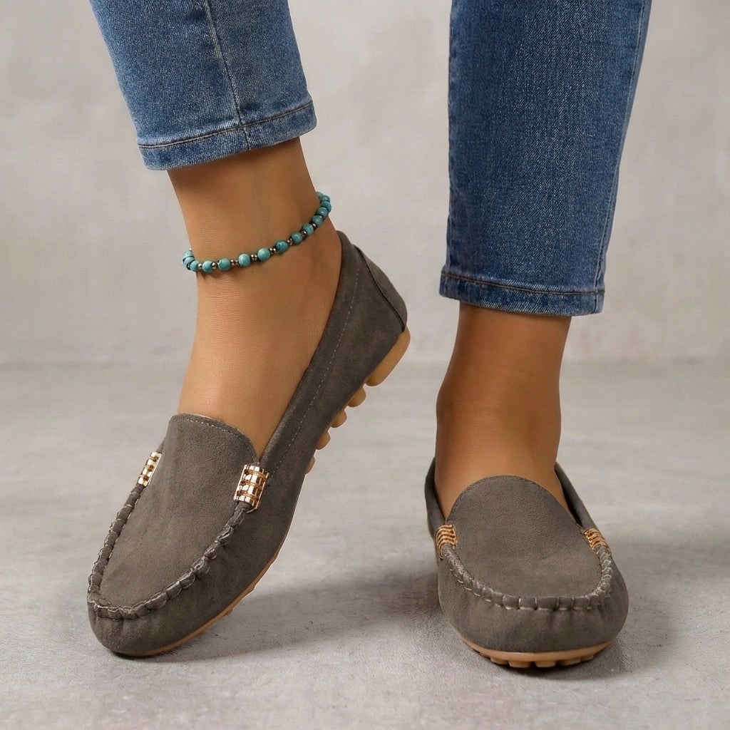 Stylish women's metallic driving moccasins, casual slip-on flats offering orthopedic support for daily fashion.