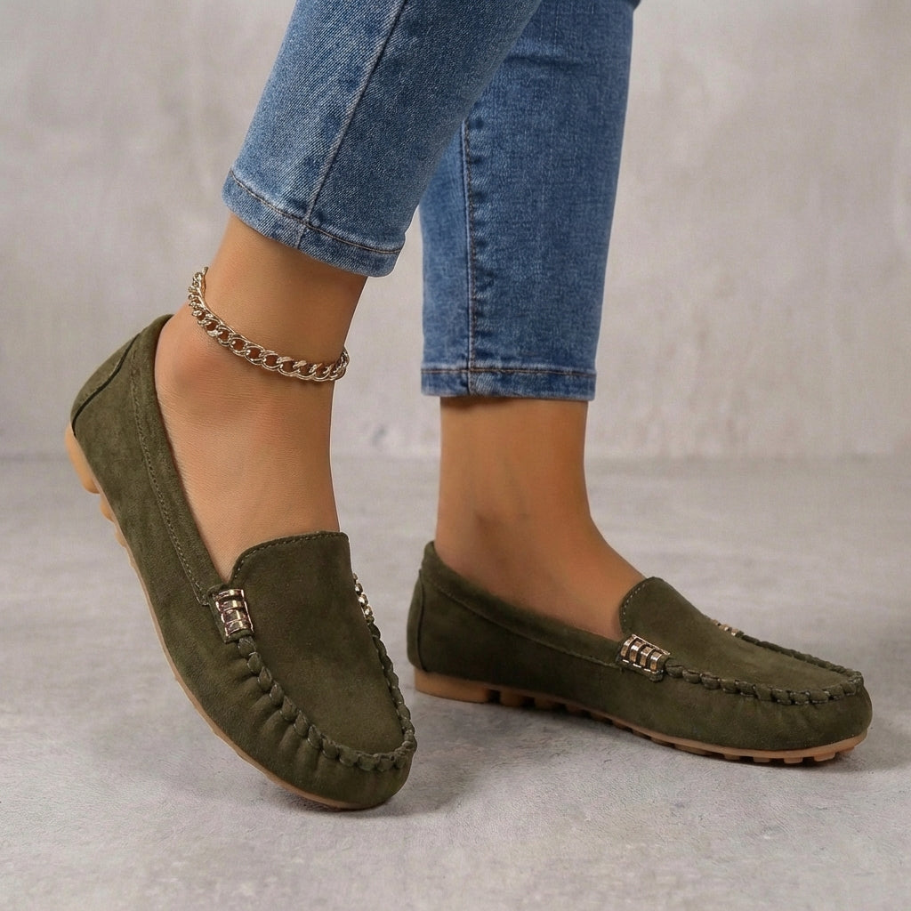 Versatile women's slip-on loafers, metallic driving moccasins offering orthopedic comfort for casual style.