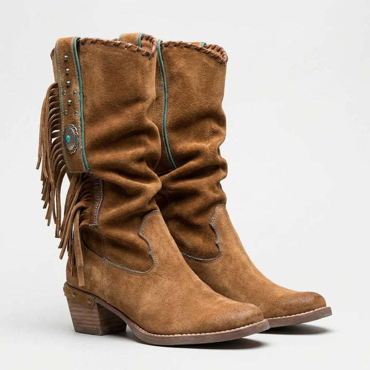 Elegant women's mid-calf boots featuring detailed fringe, a sharp pointed toe, and comfortable block heel.