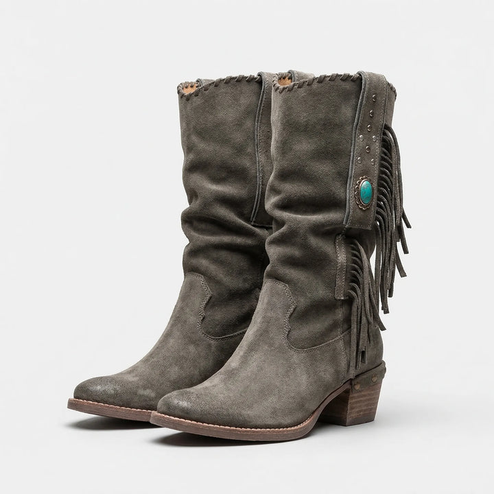 Stylish women's mid-calf fringe western boots for everyday wear. Features pointed toe & comfortable block heel.