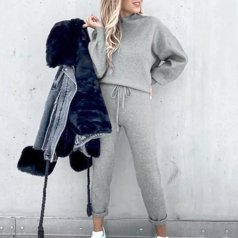 Comfortable two-piece women's set with a drawstring detail and trendy balloon sleeves, great for casual wear.