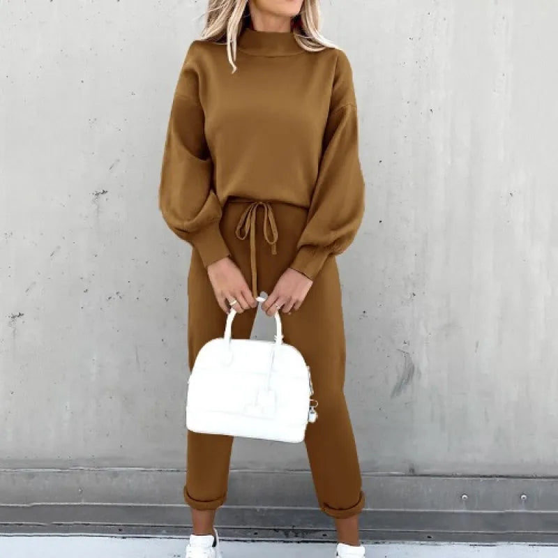 Soft women's matching loungewear set with a flattering mock neck and functional drawstring for comfort.