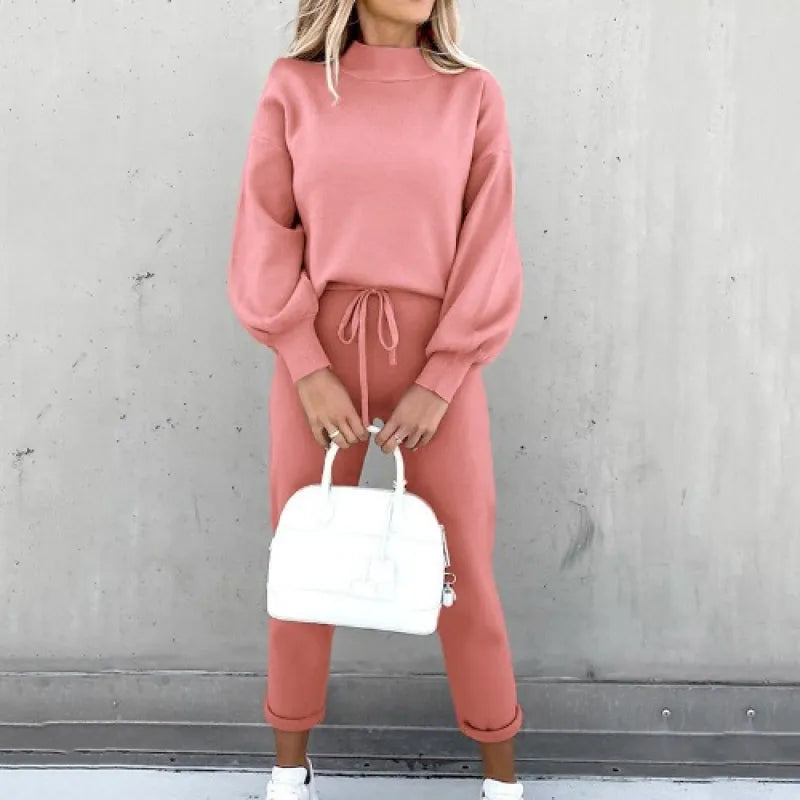 Fashionable women's mock neck set with elegant balloon sleeves & a comfortable drawstring waist for everyday style.