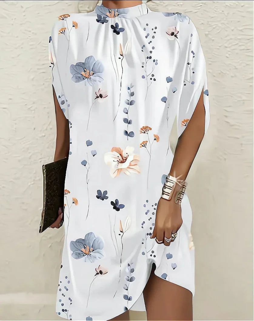 Chic women's mini dress featuring unique split cape sleeves, a stylish mock neck, and elegant design.