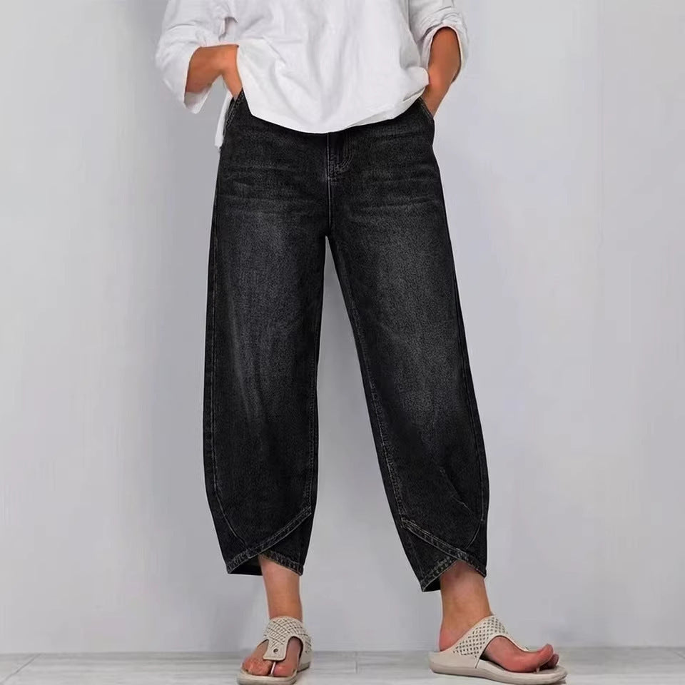 Effortless women's cropped barrel leg denim pants, featuring a trendy mid-rise design.