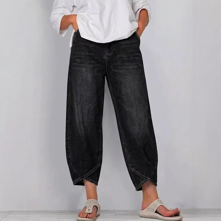 Effortless women's cropped barrel leg denim pants, featuring a trendy mid-rise design.