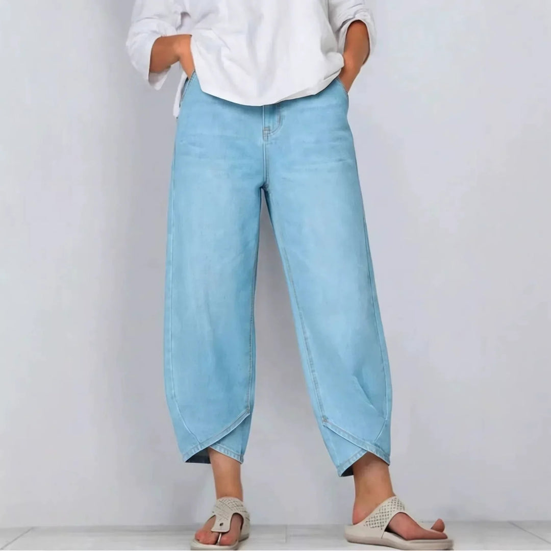 Curved barrel leg cropped denim jeans for women, perfect for a chic and relaxed casual outfit.