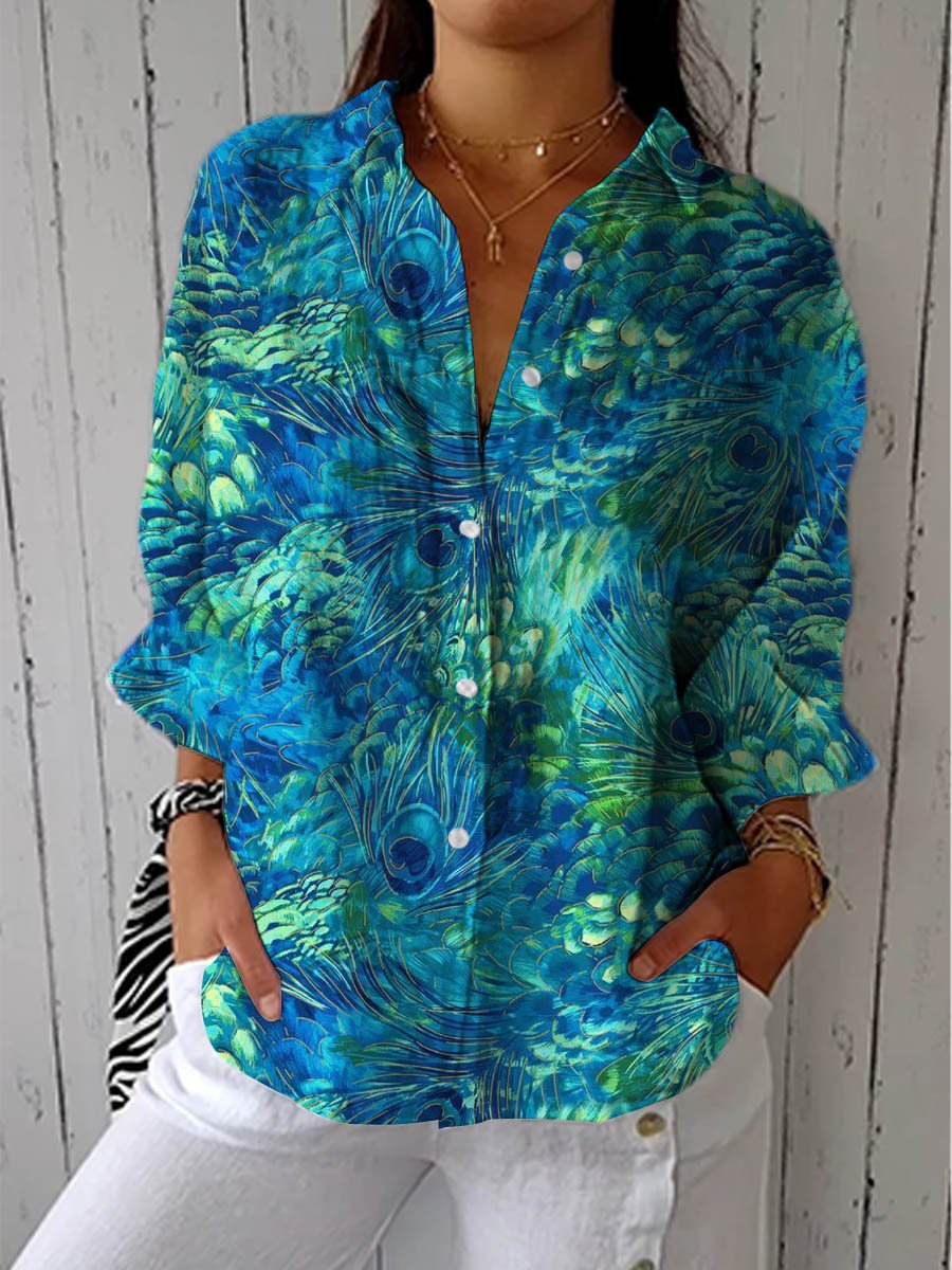 Women's multicolor peacock print V-neck long sleeve button-up blouse, perfect for casual or dressy wear.